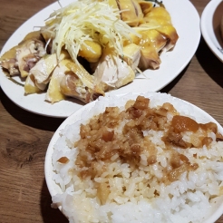 Steamed chicken with ginger strips, and a bowl of braised pork rice.